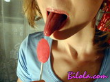 Porn Model Bilola Licks A Lollypop And Acts Like A Young Teen