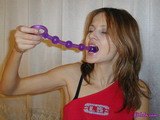 Long Rubber Toy Goes From The Ass To The Mouth