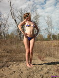 Enjoying Sunshine In A Very Small Bikini
