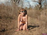 Enjoying Sunshine In A Very Small Bikini
